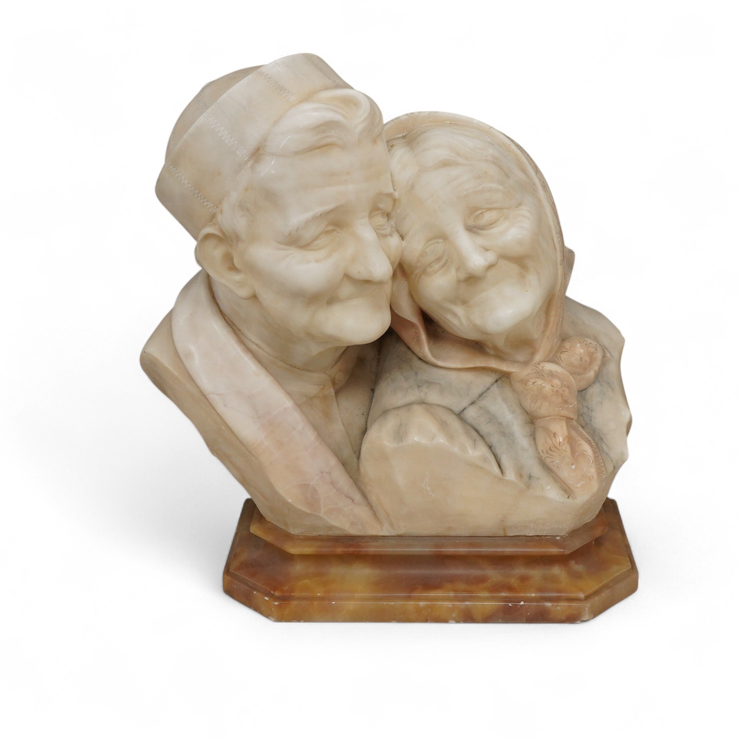 Eugenio Battiglia, (Florentine, fl. late 19th century), a carved alabaster bust of an elderly couple, 36cm high
